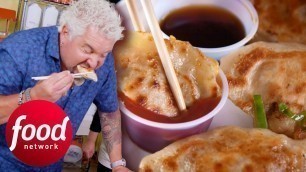 'Guy Fieri Eats One Of The Biggest Dumplings He Has Ever Seen | Diners, Drive-Ins & Dives'