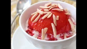 'Peach Melba Recipe - Vanilla Poached Peaches with Fresh Raspberry Sauce on Ice Cream'