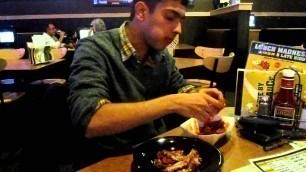 'Skanda conquers the Buffalo Wild Wings Blazin\' Challenge'