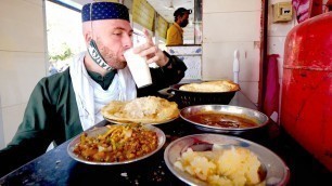 'Pindi STREET FOOD Breakfast of CHAMPIONS!! Nihari + Halwa Puri in Rawalpindi, Pakistan'