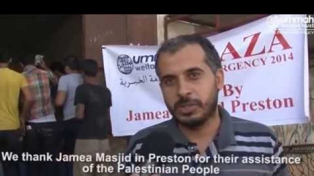 'Distributing Food Packs in Gaza (courtesy of Jamea Masjid, Preston)'