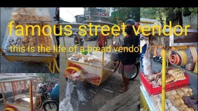 'This street vendor is awesome / foodcart vendor selling bread in the street 