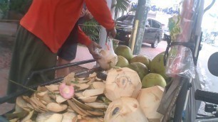 'fresh coconut from a street food cart'