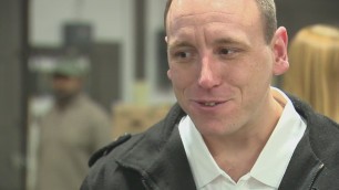 'Joey Chestnut helps at New London Food Center'