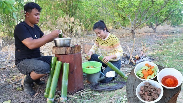 'Beef steak in bamboo shoot cooking / Countryside food cooking'