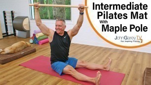 'Intermediate Mat Workout with Pole'