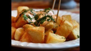 'Patatas Bravas -- Crispy Potatoes with Spicy Garlic & Chili Aioli'