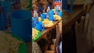 'Homeless Africans having prayers for their meals.'