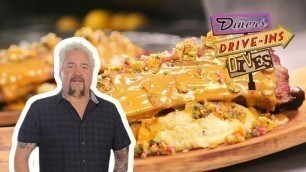 'Guy Fieri Eats El Borracho Beef Rib | Diners, Drive-Ins and Dives | Food Network'