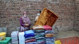 'Giving out Food, Holy Books, and Prayer Mats during Ramadan'