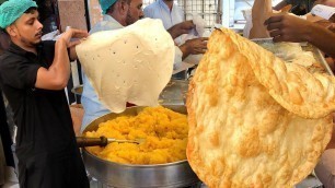 'Karachi\'s Biggest Puri Paratha | Pakistani Street Food'