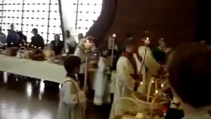 'blessing the food by a russian orthodox priest'