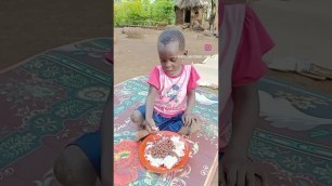 'baby Joan praying before eating food'