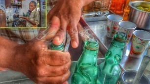 'Ginger goli soda making [ vattu soda ] | indian street food | food cult india'