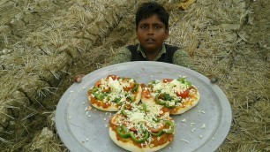 'Village style pizza  prepared by small boy suppu/VILLAGE FOOD SAFARI'