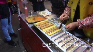 'grilled bread mix skewers  Wuhan  street food China'