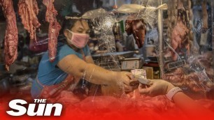 'China reopens wet markets in Wuhan as COVID-19 pandemic sweeps world'