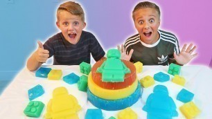 'GIANT GUMMY CANDY LEGO JELL-O CAKE! Gummy Food VS Real Food | Kyle\'s Toys and Games'