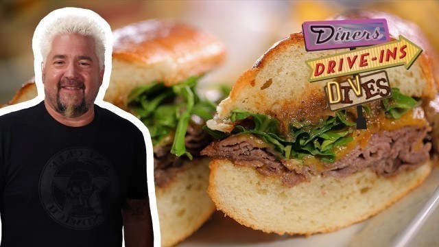 'Guy Fieri Eats a Juicy Roast Beef Sandwich | Diners, Drive-Ins and Dives | Food Network'