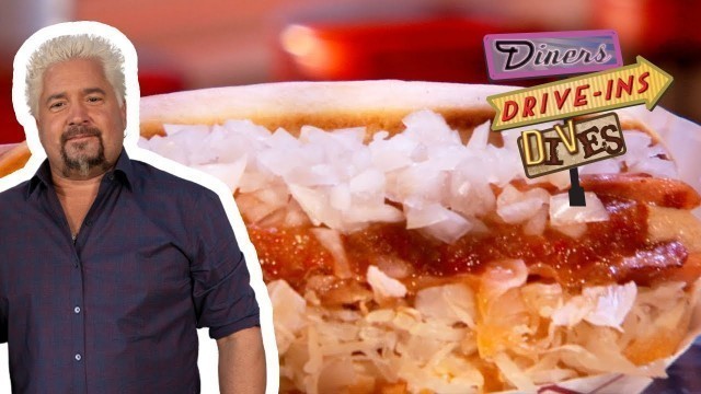 'Guy Fieri Tries a \"New Englander\" Hot Dog | Diners, Drive-Ins and Dives | Food Network'