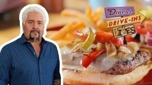 'Guy Fieri Eats a Filet Sandwich | Diners, Drive-Ins and Dives | Food Network'