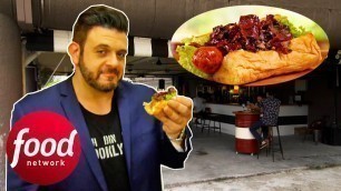 'Adam Tries The GOLDEN DOG From Singapore Car Park Bar & Restaurant | Secret Eats With Adam Richman'